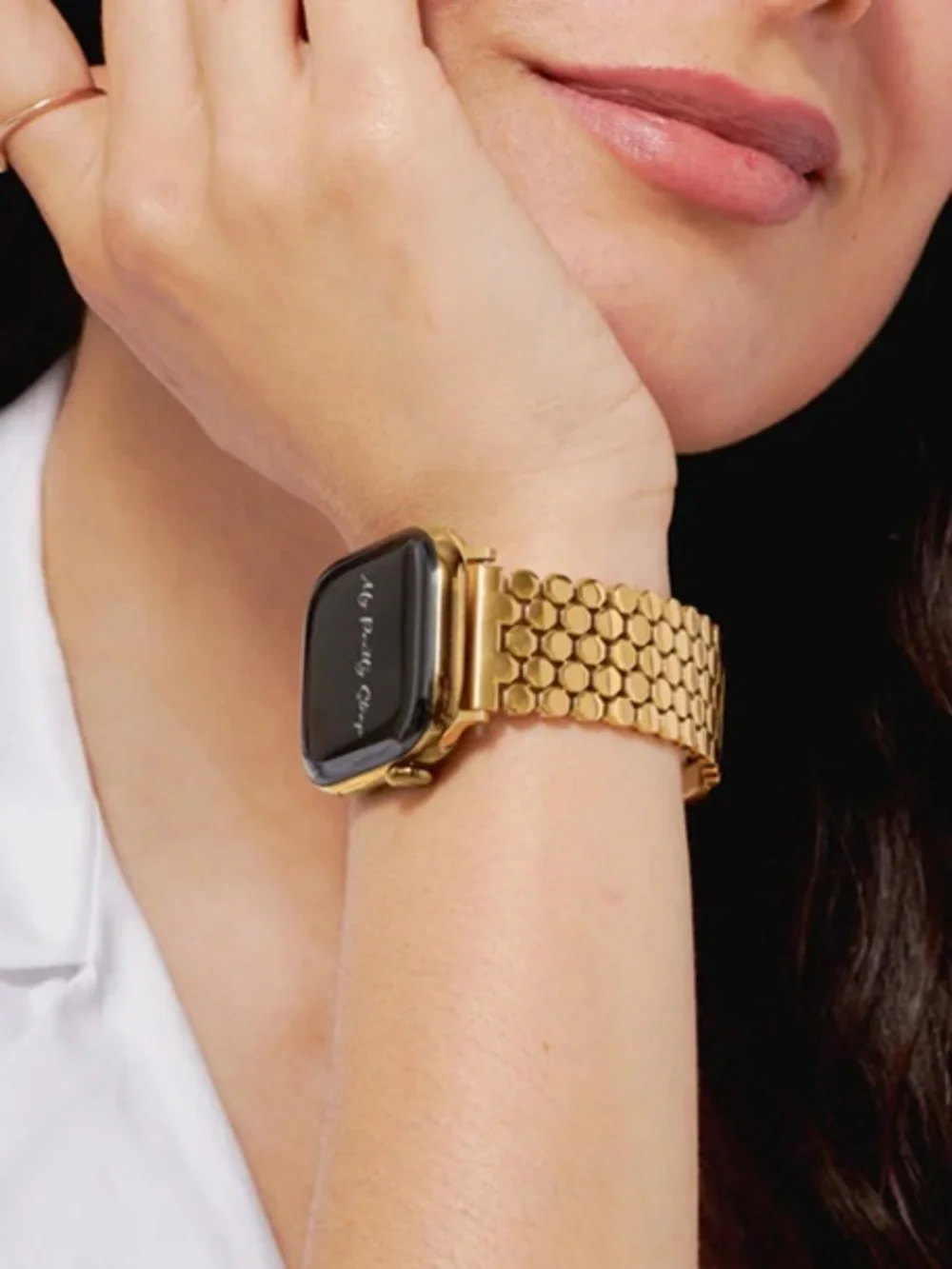 Honeycomb stainless steel strap in gold tone for Apple Watch.
